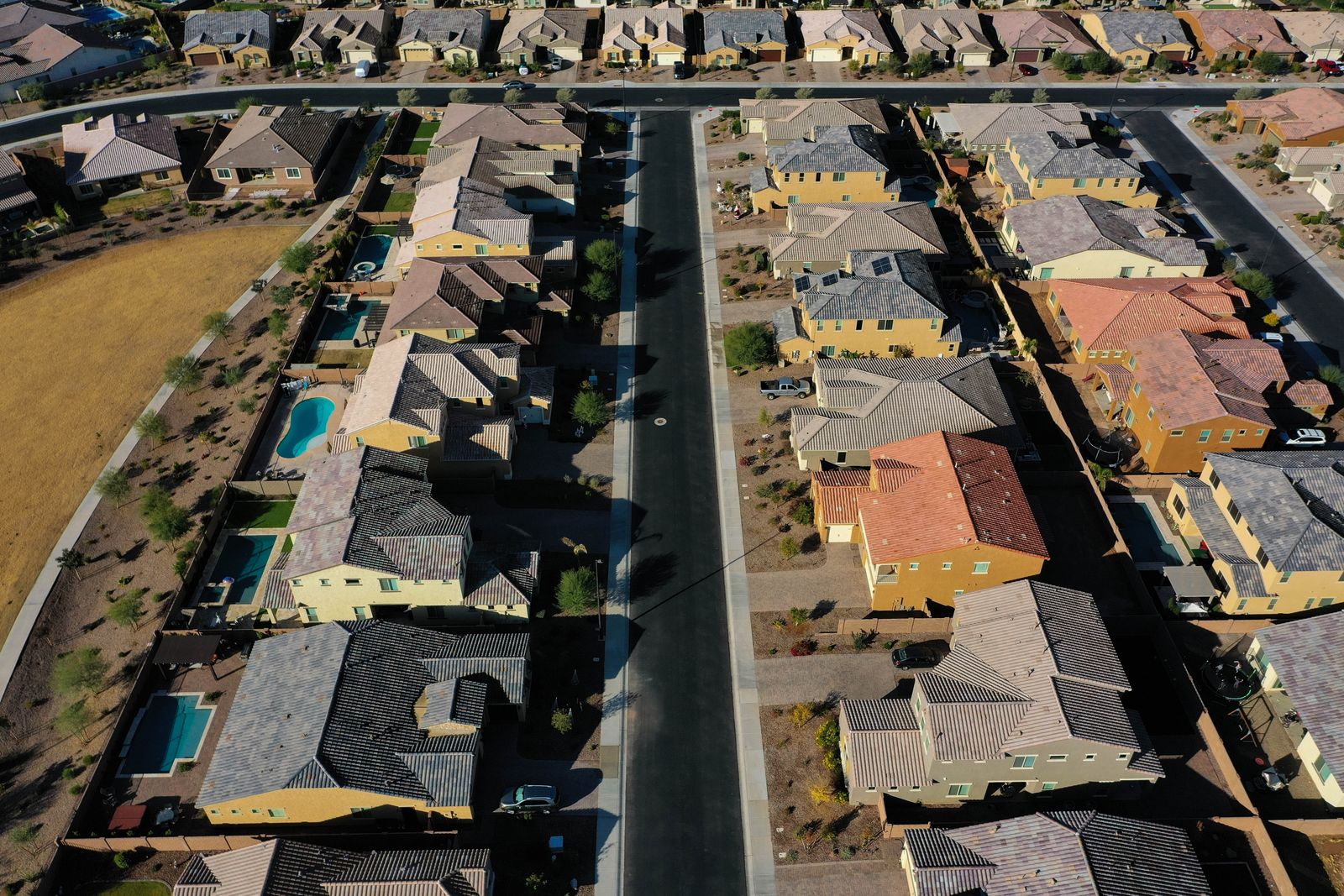 Aerial view showing residential homes, lot patterns and neighborhood streets